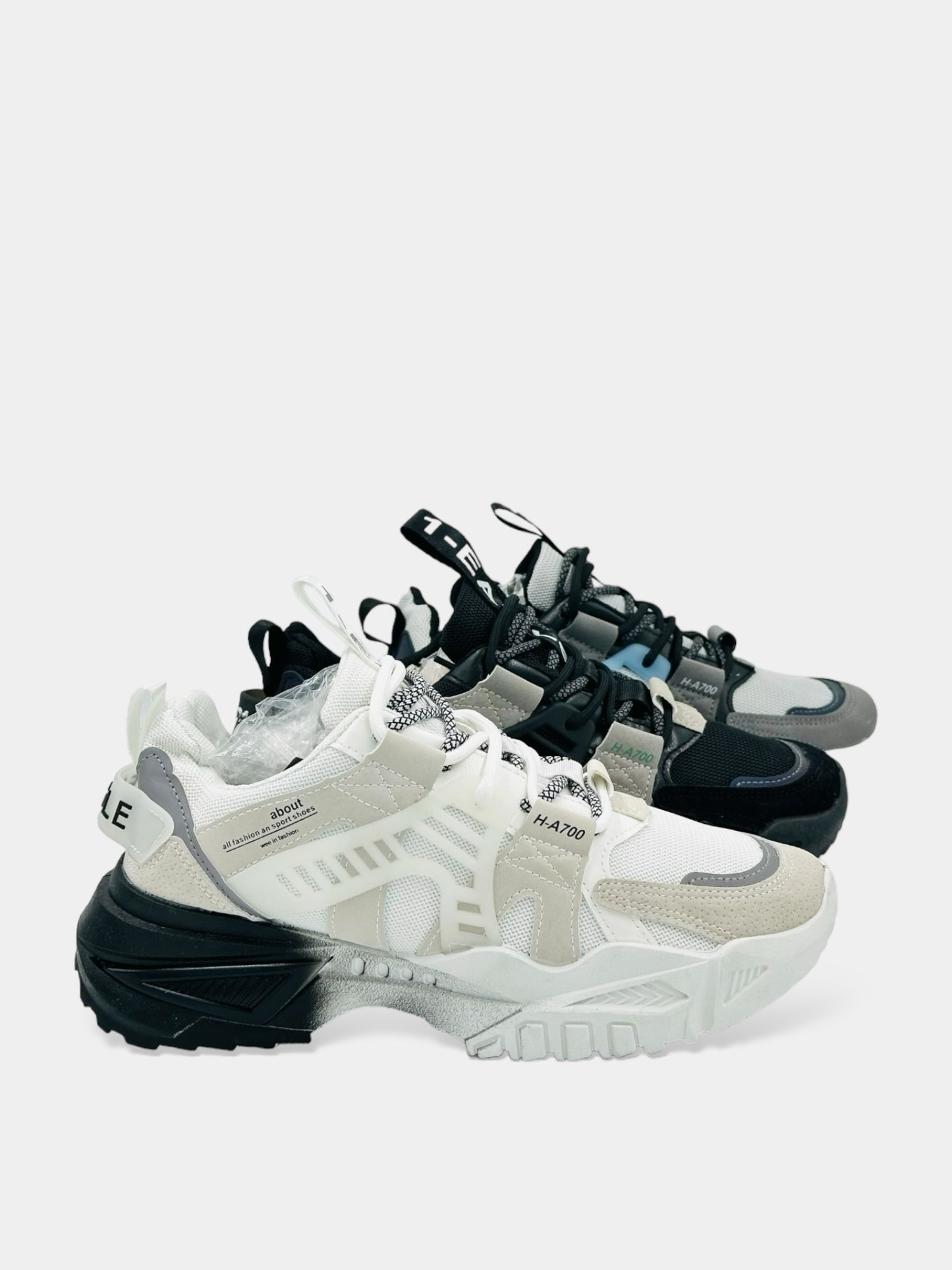 TENIS COLOR BLANCO, GRIS Y NEGRO